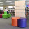 sizzle ottomans in library purple and orange