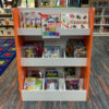 picture book display book shelf orange and white